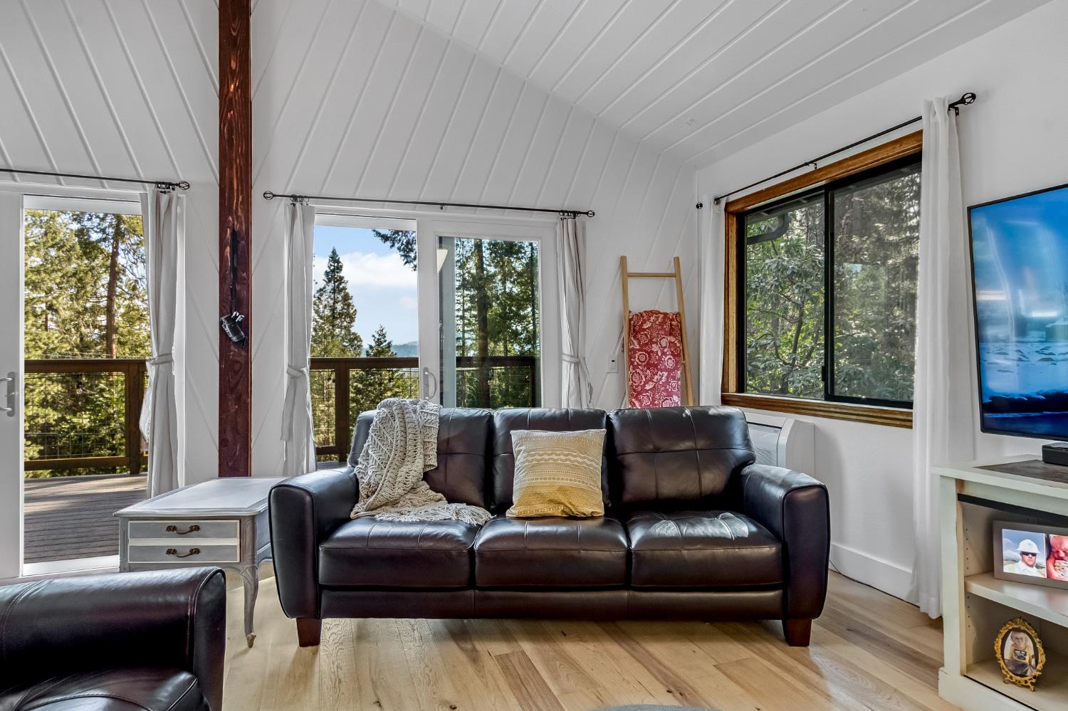 12081 Robust Way Nevada City, CA 95959 - Photo 11 of 39 a living room with furniture and a large window