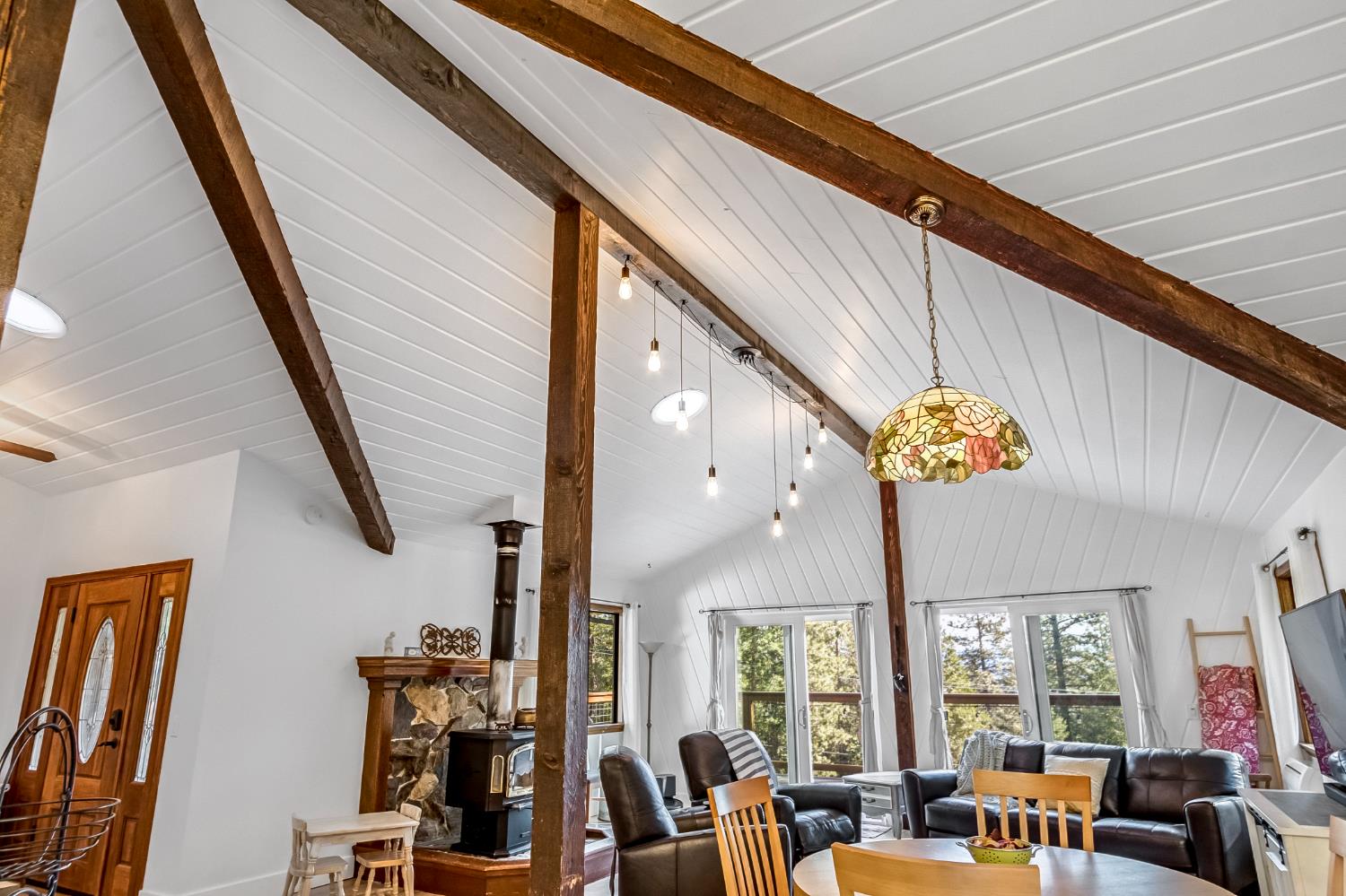 12081 Robust Way Nevada City, CA 95959 - Photo 13 of 39 a view of a dining room with furniture wooden floor and chandelier