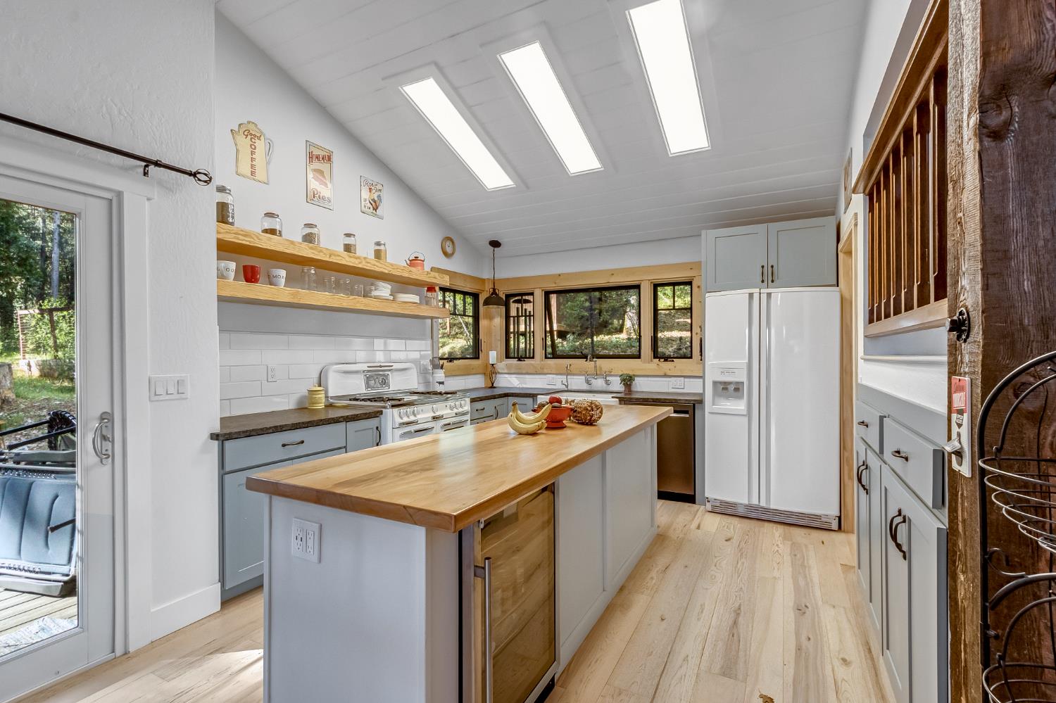 12081 Robust Way Nevada City, CA 95959 - Photo 15 of 39 a kitchen with a sink stove and refrigerator