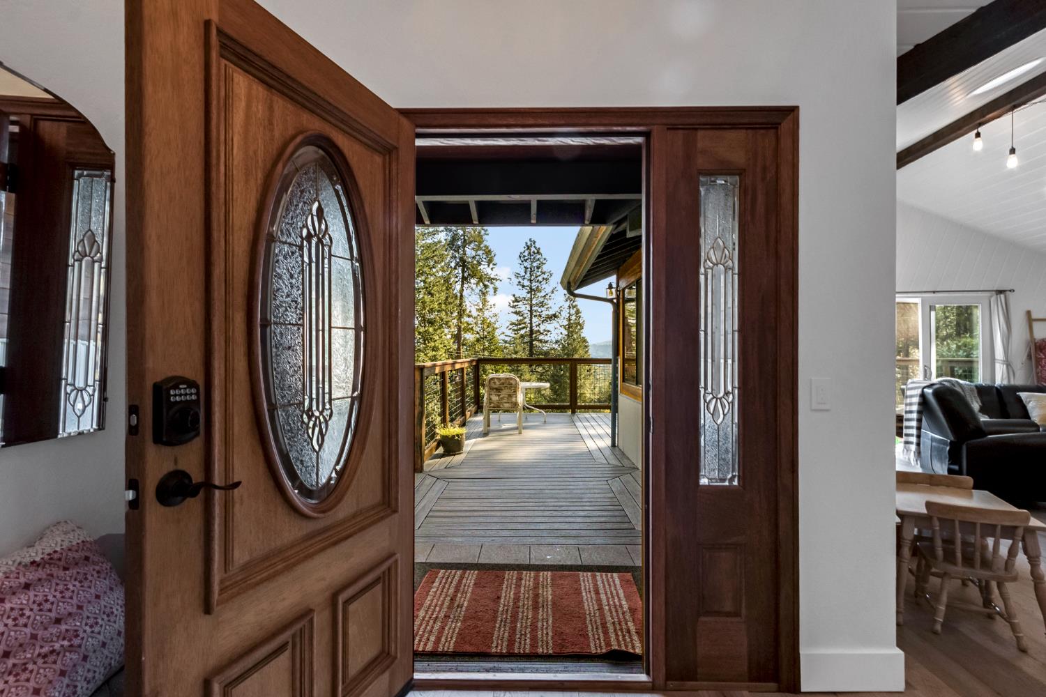 12081 Robust Way Nevada City, CA 95959 - Photo 3 of 39 a view of a entryway door front of a house