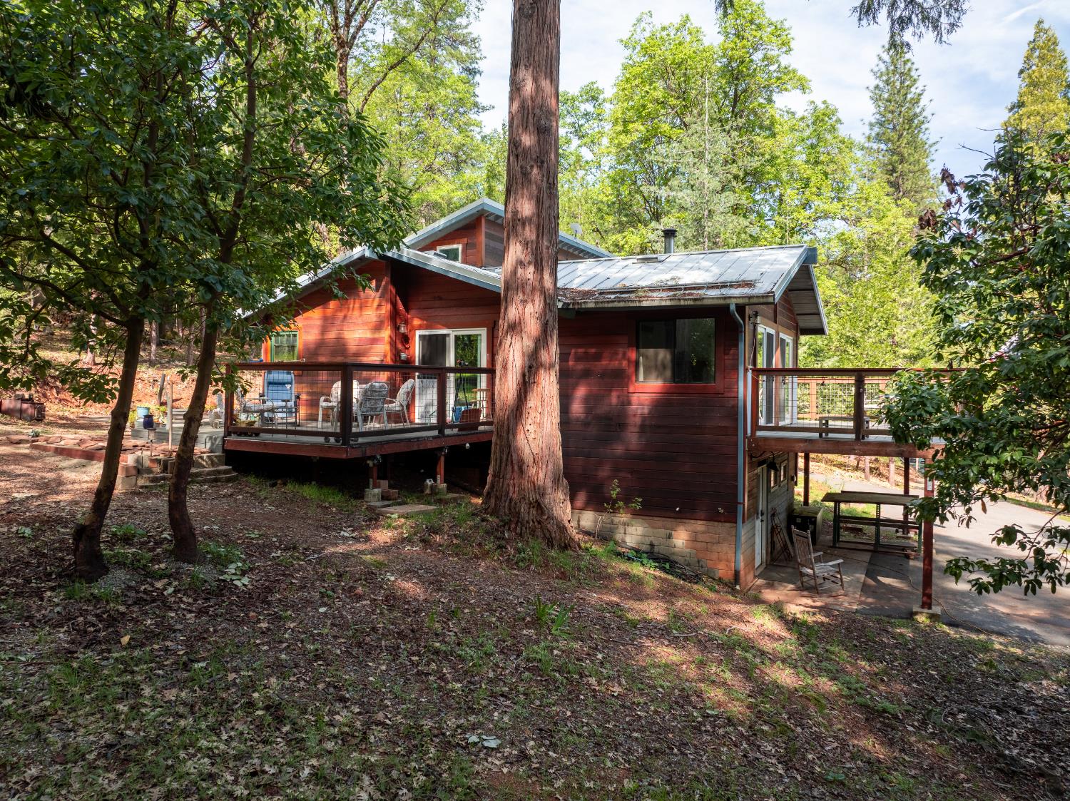 12081 Robust Way Nevada City, CA 95959 - Photo 36 of 39 a view of a house with a yard