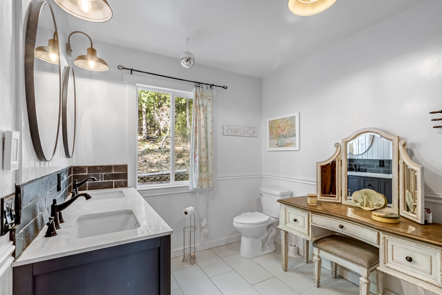 12081 Robust Way Nevada City, CA 95959 - Photo 6 of 39 a bathroom with a sink and a mirror