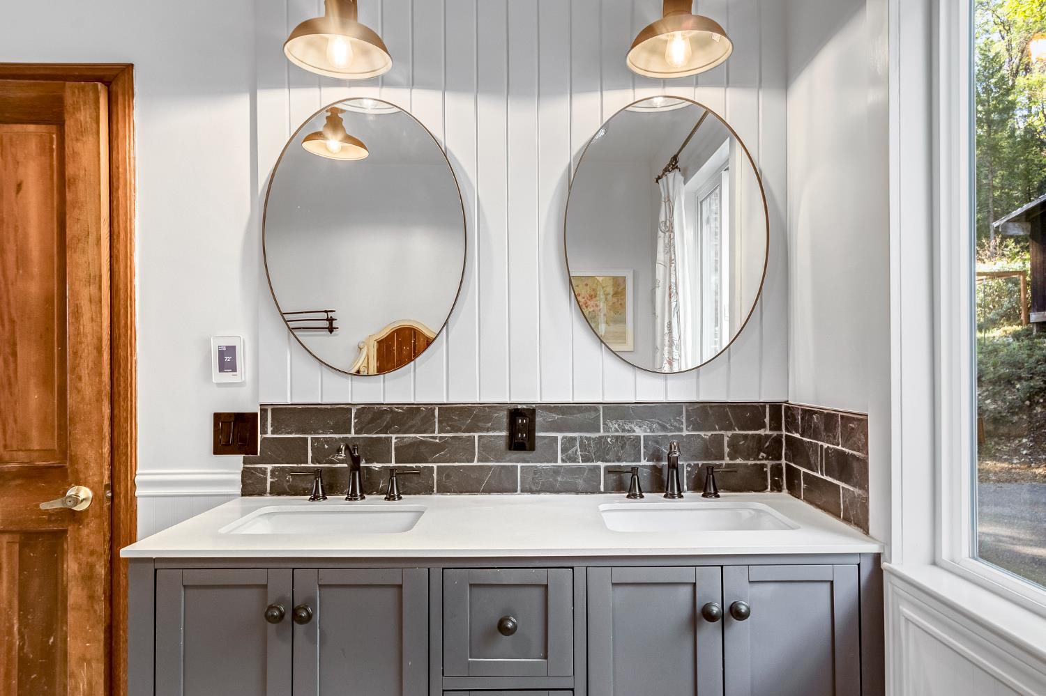 12081 Robust Way Nevada City, CA 95959 - Photo 7 of 39 a bathroom with a sink and a mirror