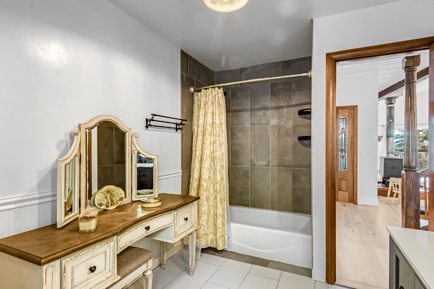 12081 Robust Way Nevada City, CA 95959 - Photo 8 of 39 a bathroom with a granite countertop sink mirror bathtub and shower
