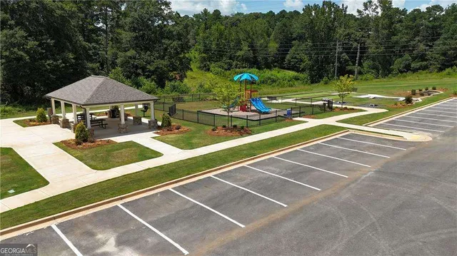 a living room with furniture and a yard