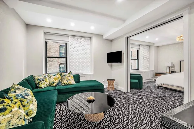 a kitchen with a sink and a refrigerator