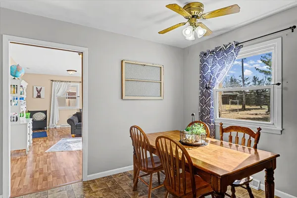 a view of a dining room with furniture