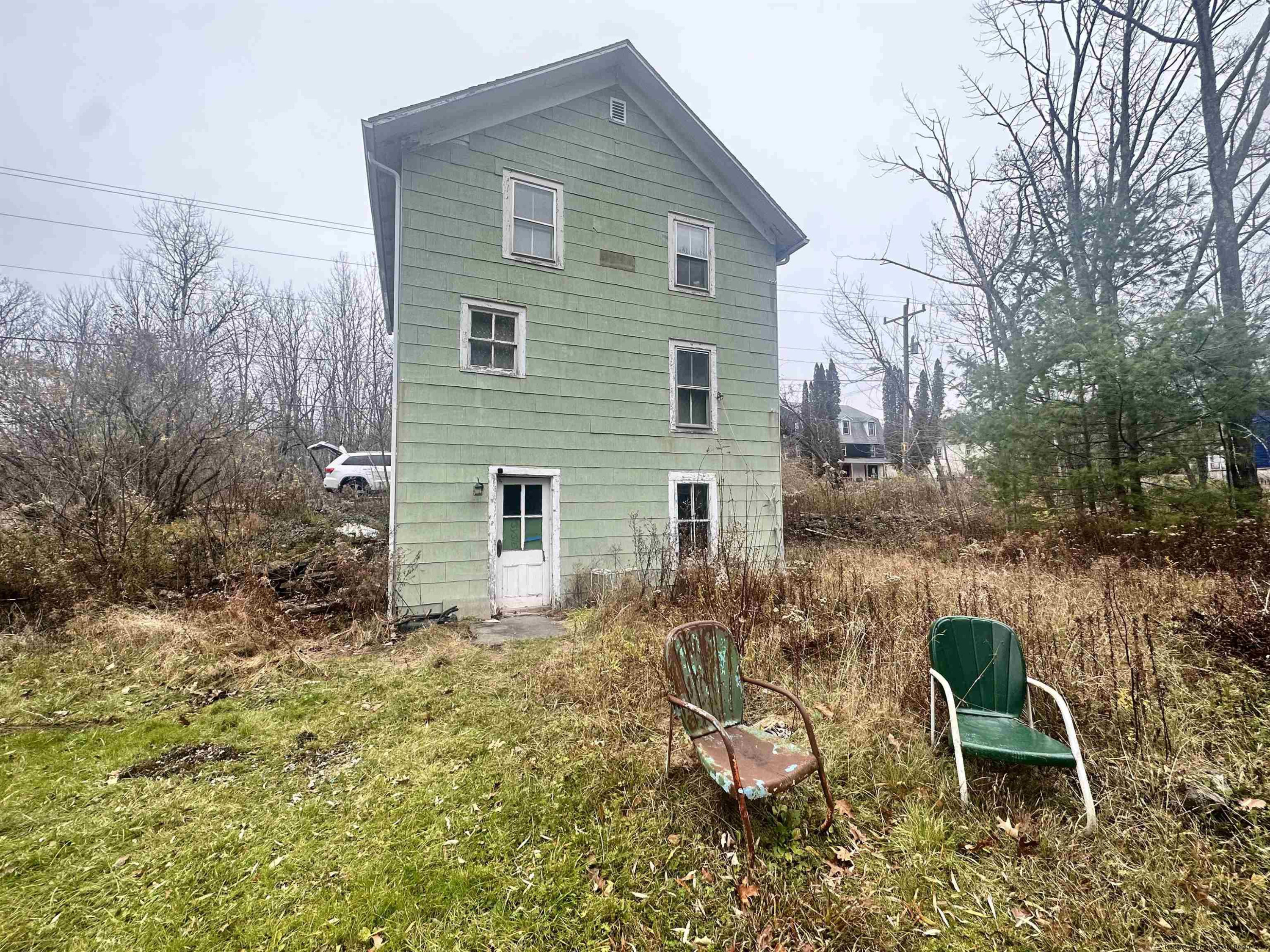 258 North Lake Road Haines Falls, NY 12436 - Photo 12 of 12 a backyard of a house with table and chairs