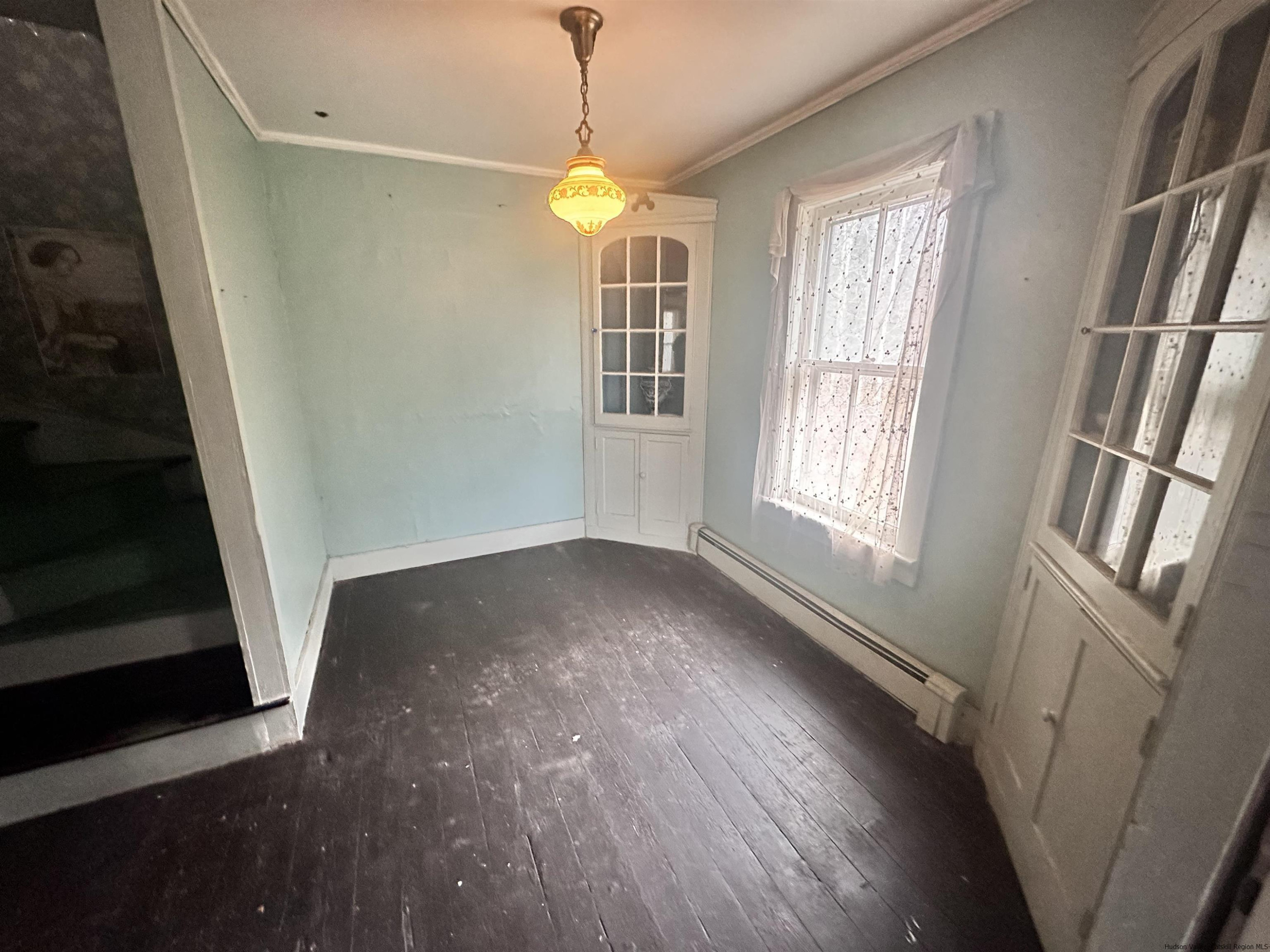 258 North Lake Road Haines Falls, NY 12436 - Photo 4 of 12 a view of empty room with wooden floor and fan