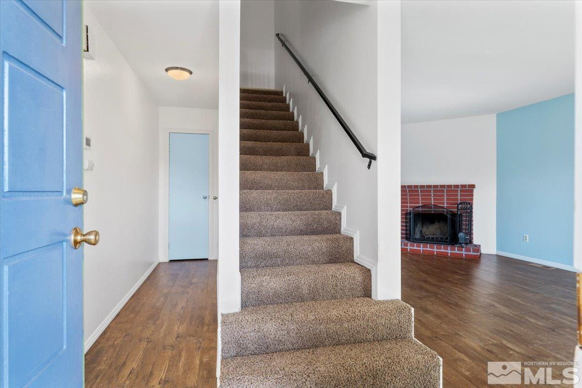 3475 Balboa Drive Reno, NV 89503 - Photo 21 of 37 a view of a livingroom with wooden floor and a fireplace