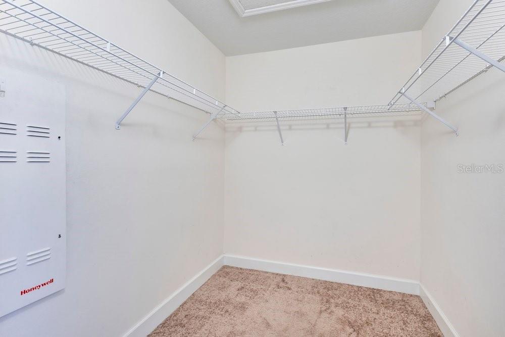 125 Manor View Lane DeLand, FL 32724 - Photo 18 of 37 a view of a room with racks on the wall