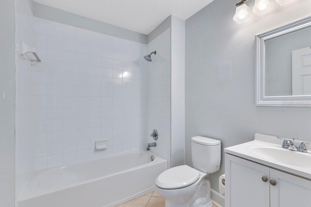 125 Manor View Lane DeLand, FL 32724 - Photo 20 of 37 a white toilet sitting next to a bath tub