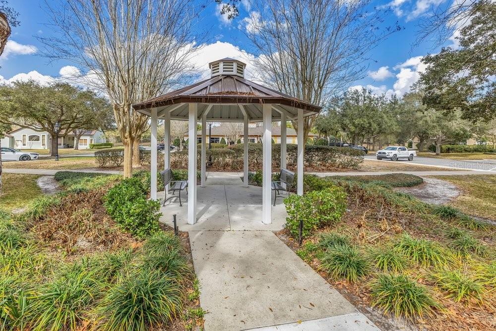 125 Manor View Lane DeLand, FL 32724 - Photo 26 of 37 a view of a garden with patio