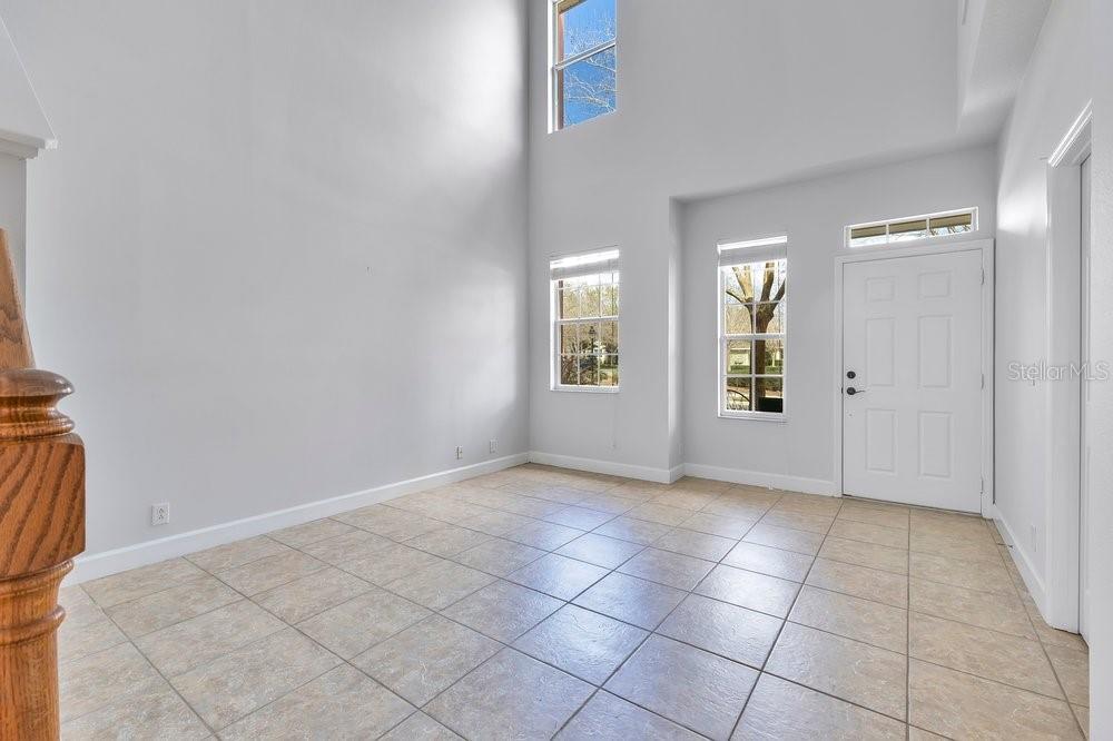 125 Manor View Lane DeLand, FL 32724 - Photo 3 of 37 an empty room with windows and closet
