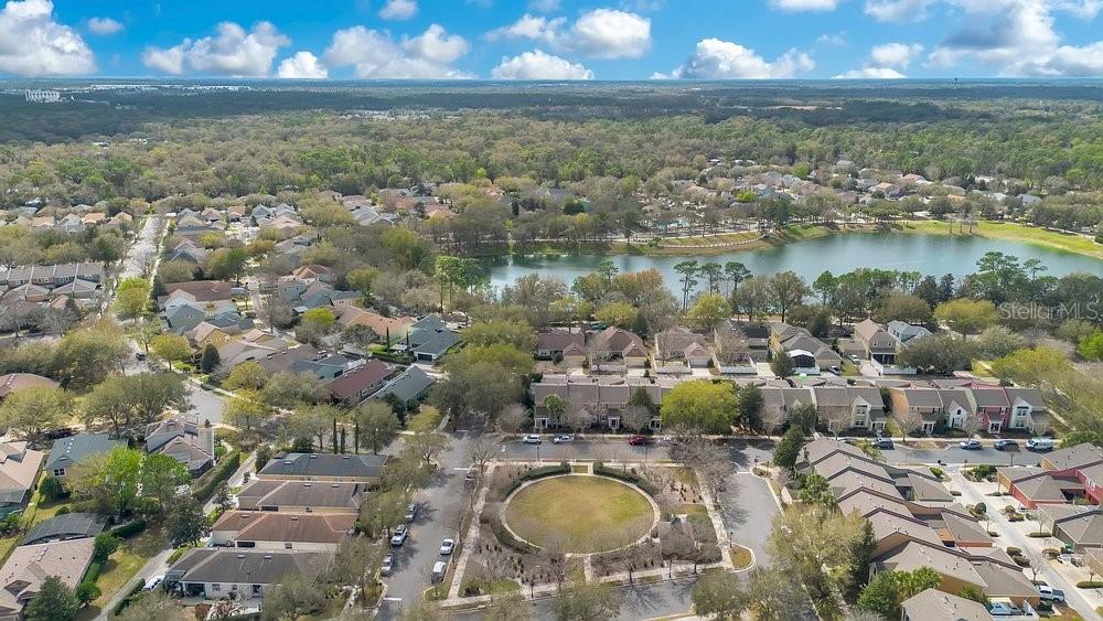 125 Manor View Lane DeLand, FL 32724 - Photo 34 of 37 a view of a lake in front of residential houses with outdoor space