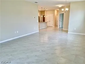 a view of a hallway with a bathroom