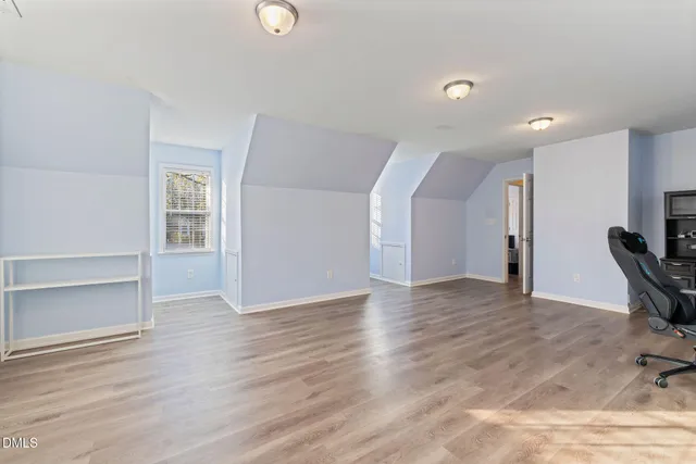 a view of livingroom with furniture and a window