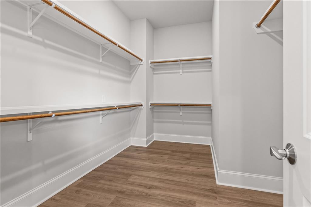 10025 Ruppel Lane Johns Creek, GA 30005 - Photo 12 of 23 a view of an empty walk in closet