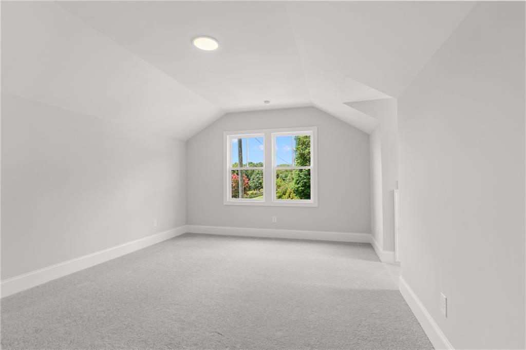 10025 Ruppel Lane Johns Creek, GA 30005 - Photo 20 of 23 an empty room with windows