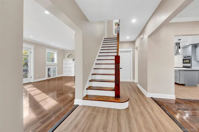 a view of entryway with wooden floor