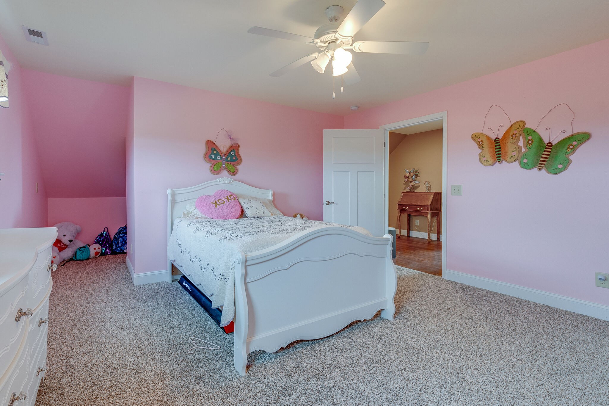 95 Switchboard Road Brush Creek, TN 38547 - Photo 20 of 35 a bedroom with a bed and a chandelier