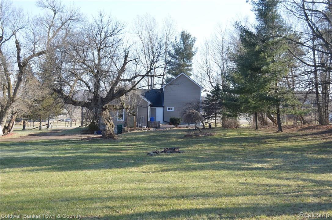 7575 North Fowlerville Road Fowlerville, MI 48836 - Photo 31 of 34 Back Of House