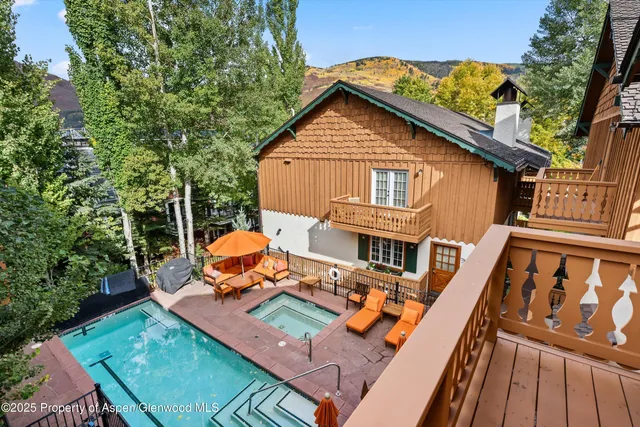 a view of roof deck with seating area