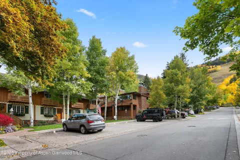 a car parked in front of a house