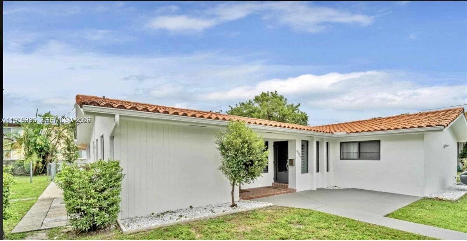 6004 Northwest 38th Street, Unit 6006 Virginia Gardens, FL 33166 - Photo 1 of 5 Primary