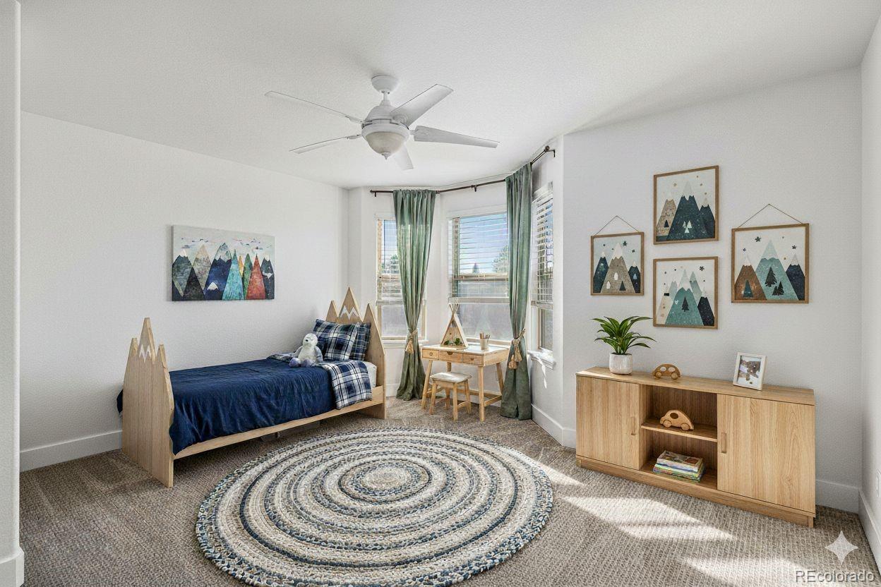 12665 South Robinson Ranch Boulevard Parker, CO 80134 - Photo 25 of 38 a living room with furniture and a large window