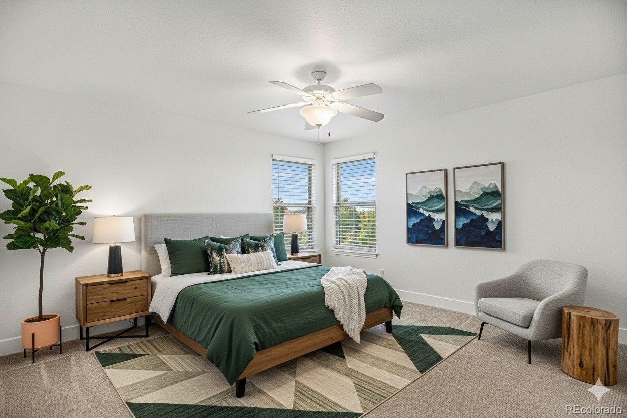 12665 South Robinson Ranch Boulevard Parker, CO 80134 - Photo 26 of 38 a bedroom with a bed and a potted plant