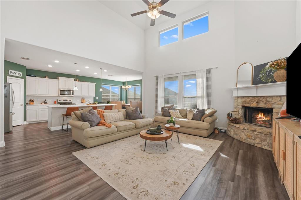 3725 Ranchers Ridge Krum, TX 76249 - Photo 1 of 38 a living room with furniture and a fireplace
