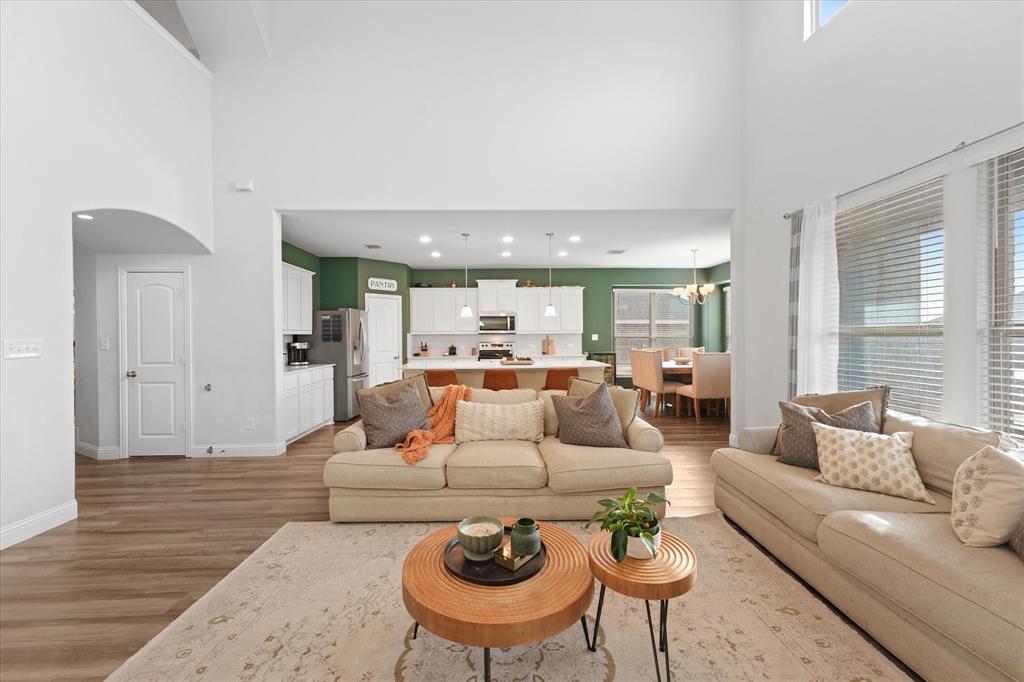 3725 Ranchers Ridge Krum, TX 76249 - Photo 12 of 38 a living room with furniture and a wooden floor