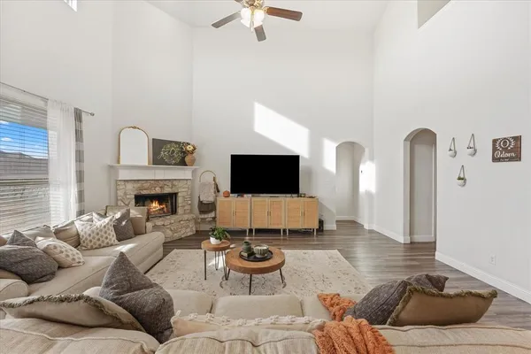 a living room with furniture or couch and a fireplace