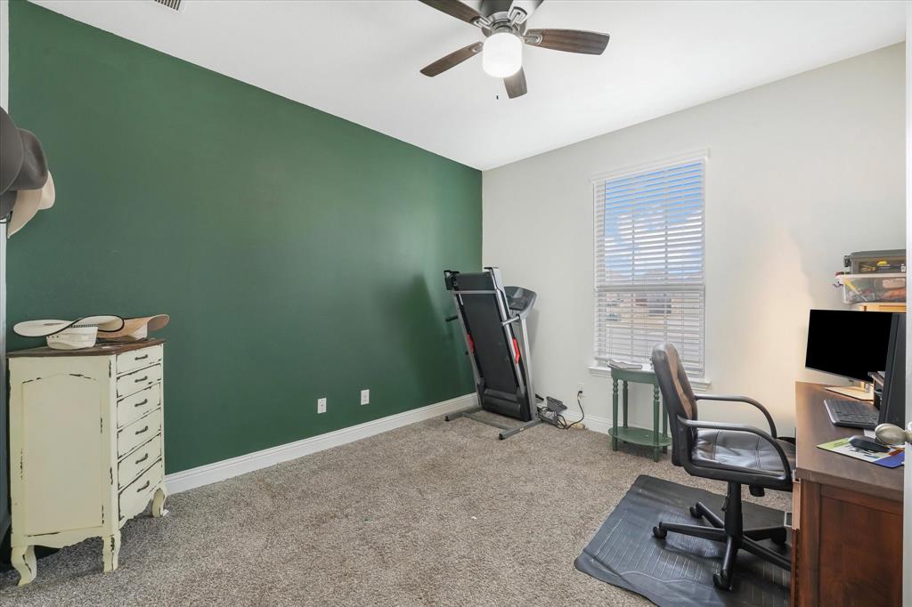 3725 Ranchers Ridge Krum, TX 76249 - Photo 26 of 38 a view of a workspace with furniture and a window