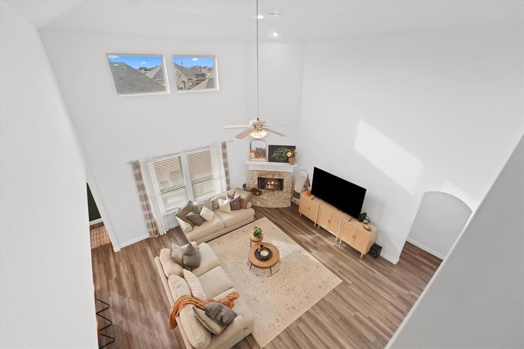 3725 Ranchers Ridge Krum, TX 76249 - Photo 34 of 38 a living room with furniture and a flat screen tv