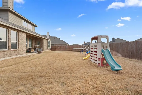 a view of a house with a park