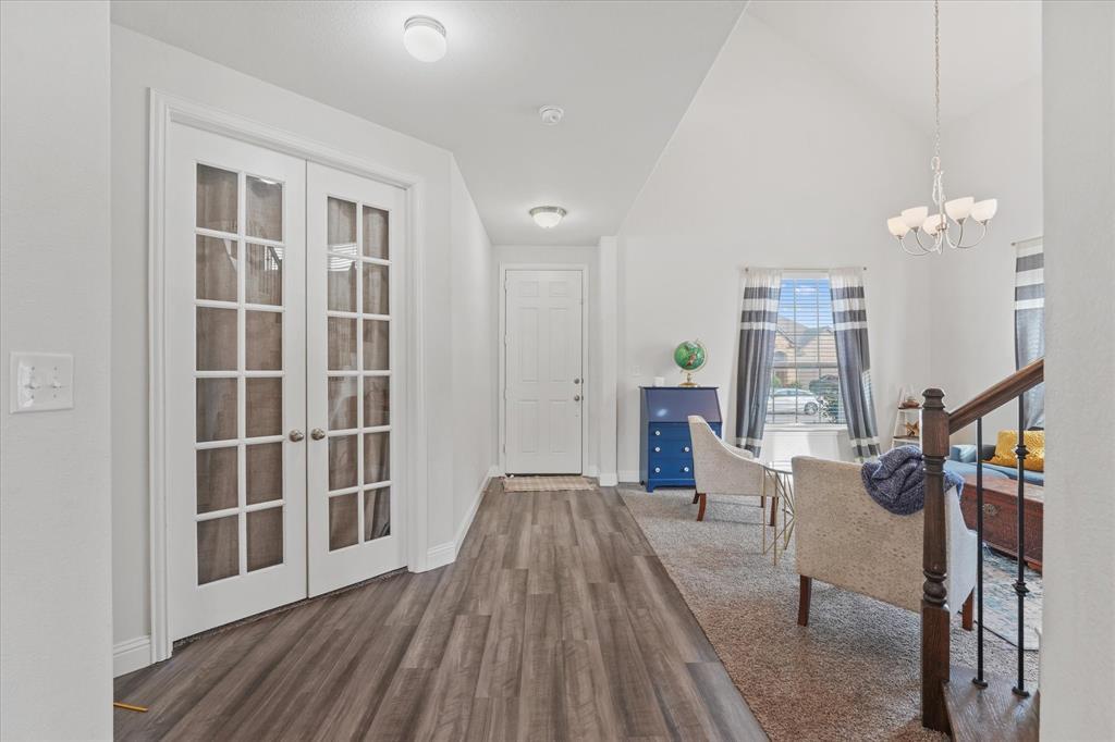 3725 Ranchers Ridge Krum, TX 76249 - Photo 6 of 38 a view of a house with wooden floor and stairs