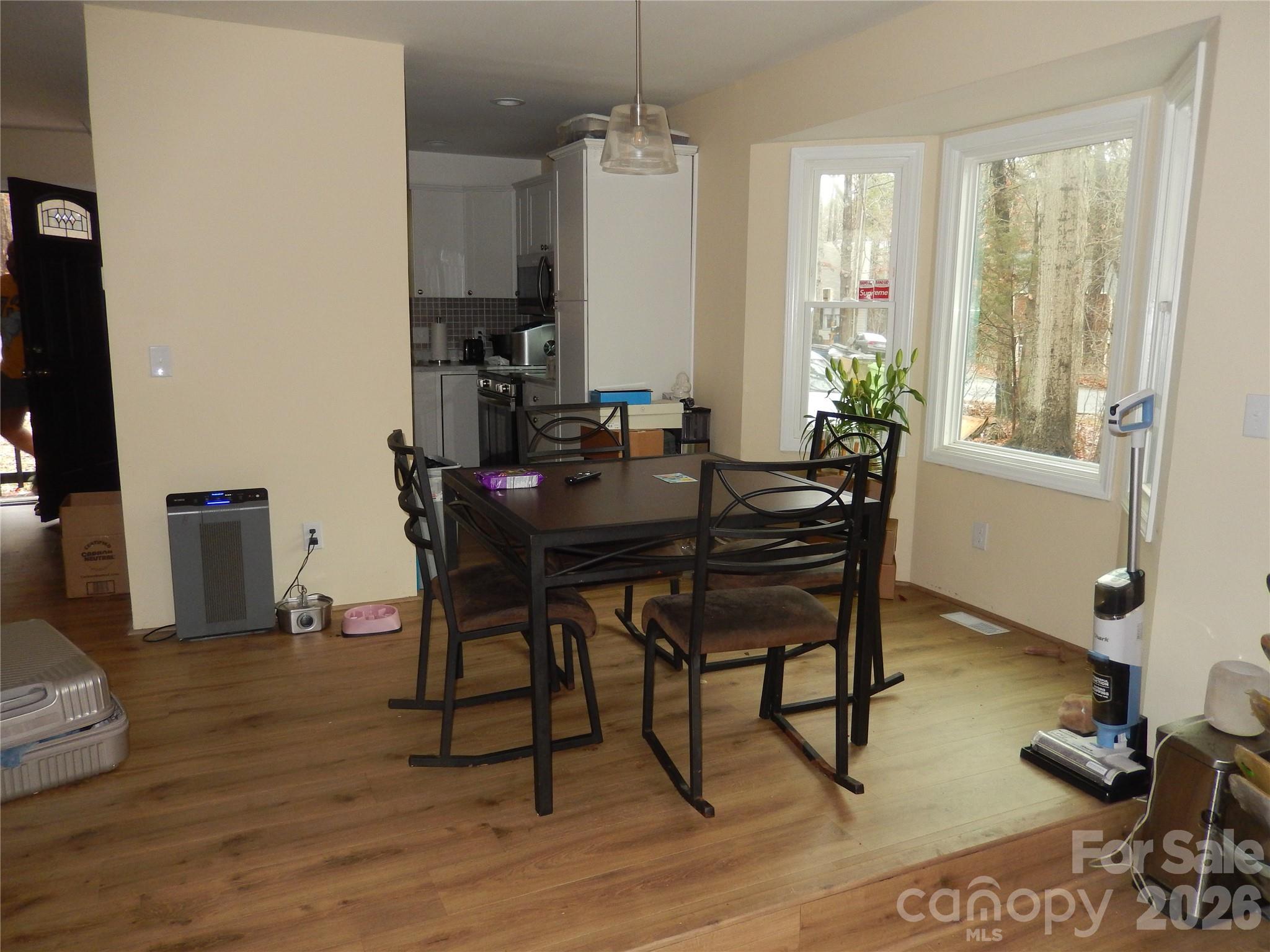 549 Brent Road Raleigh, NC 27606 - Photo 3 of 9 a view of a dining room with furniture and a window