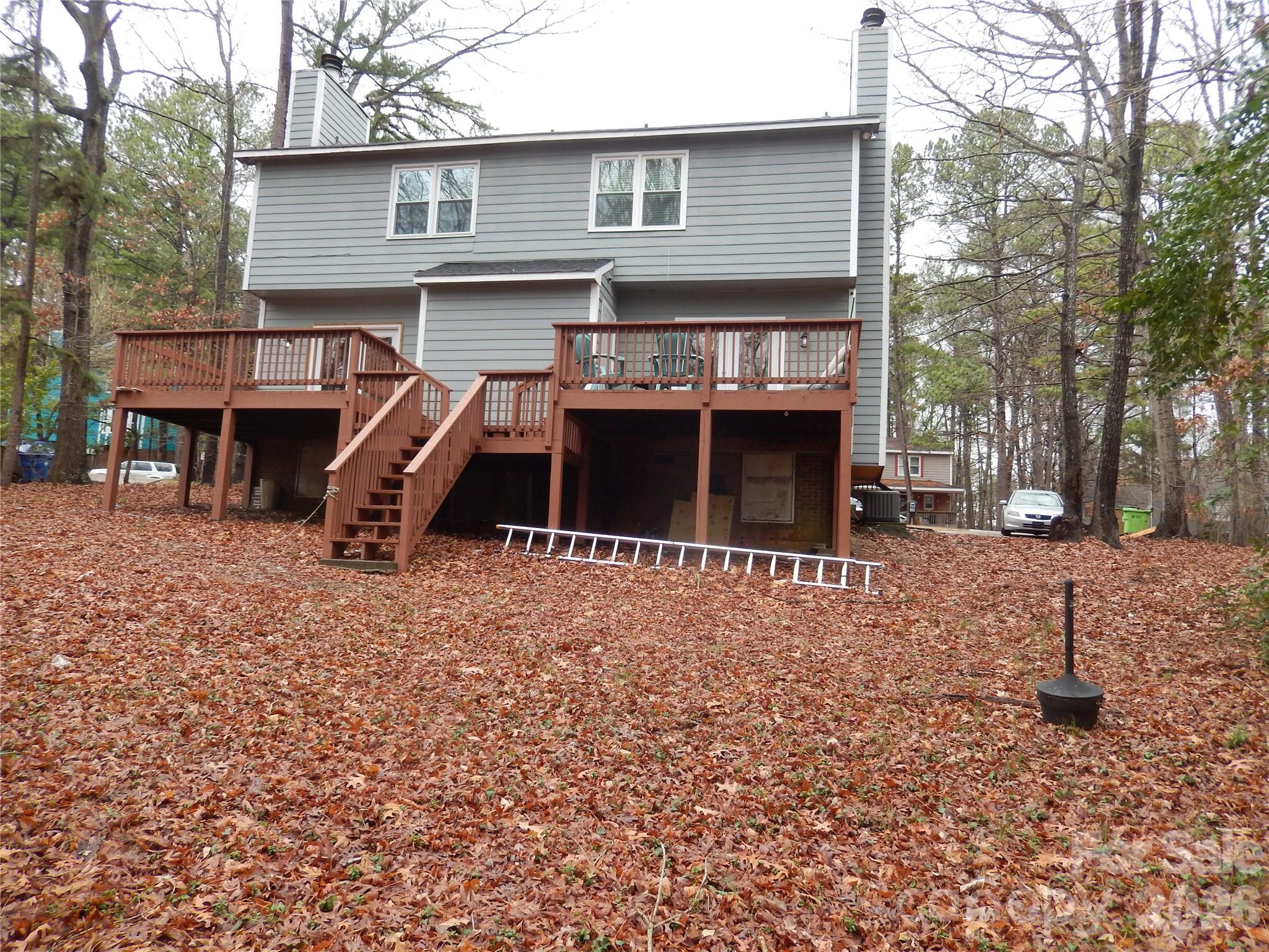 549 Brent Road Raleigh, NC 27606 - Photo 9 of 9 a front view of a house with a yard and garage