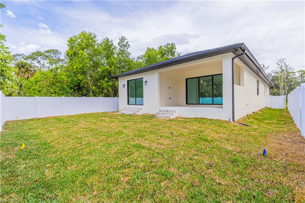 3074 Pine Tree Drive Naples, FL 34112 - Photo 3 of 18 a view of outdoor space yard and balcony