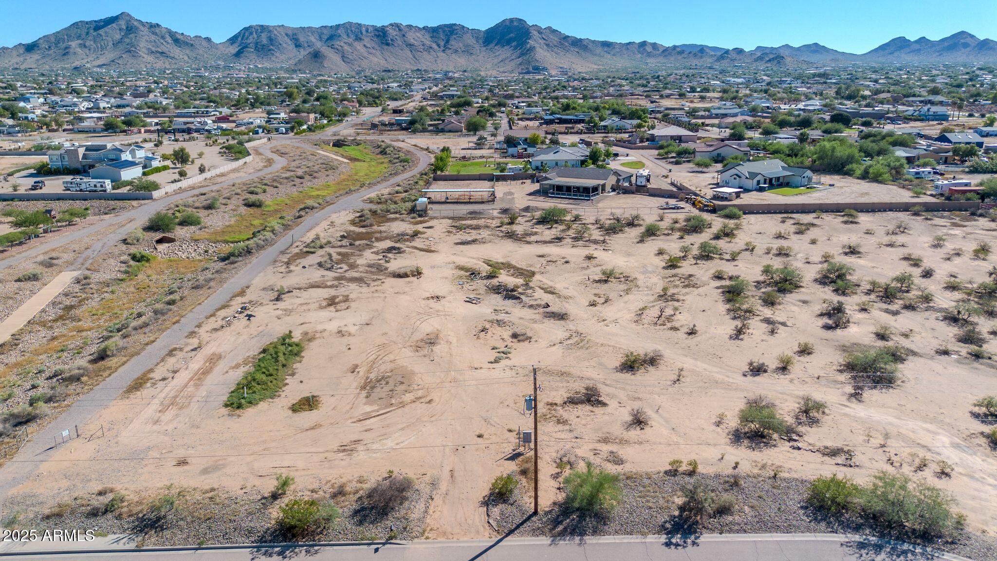 20127 East Marsh Road Queen Creek, AZ 85142 - Photo 12 of 34 an aerial view of residential house and sandy dunes