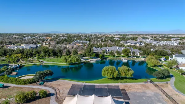 a view of a lake with a city