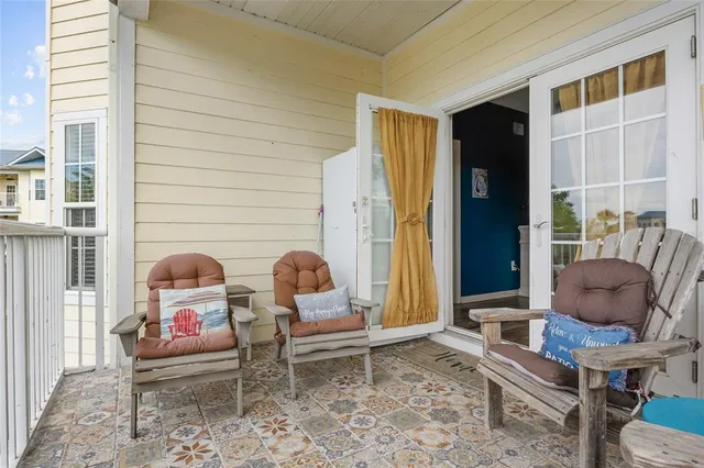 a view of a balcony with lake view and a ocean view