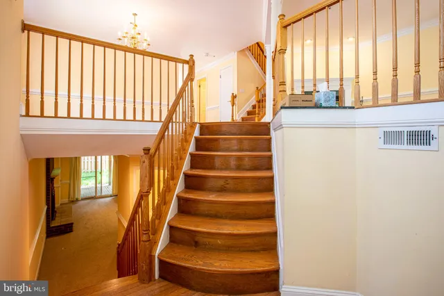 a view of staircase with large window