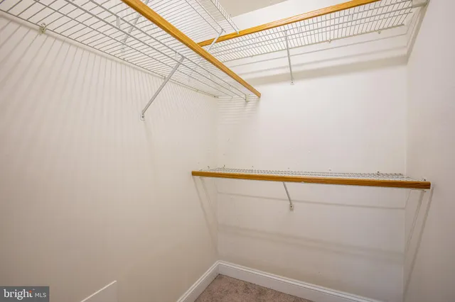 a view of small space with racks on the wall