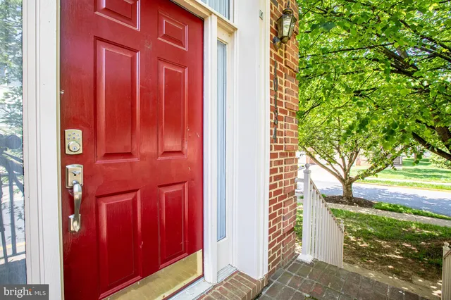 a view of a wooden door of the house