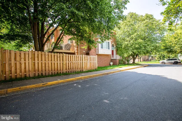 a view of a street with a trees