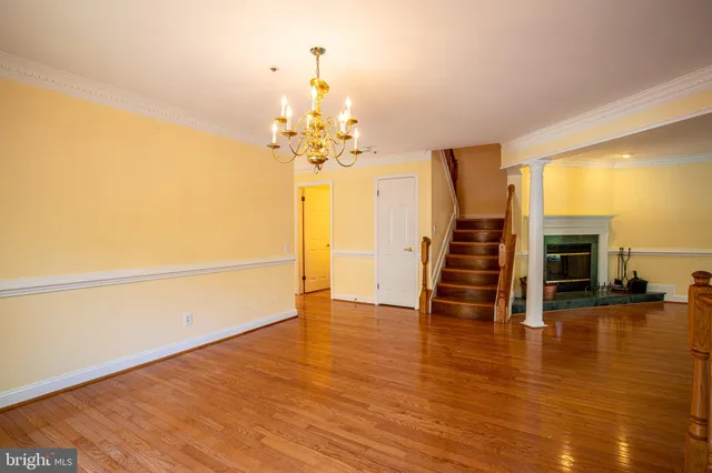 a view of a livingroom with wooden floor