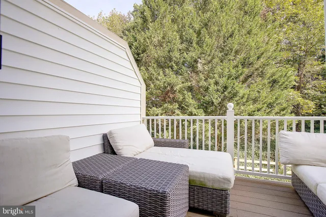 a balcony with wooden floor